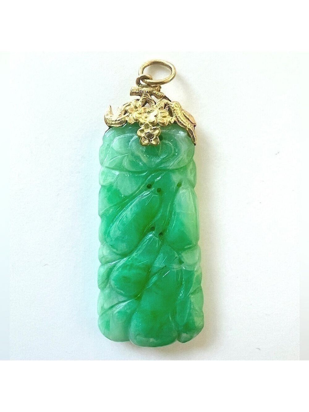 Antique carved jade pendant with real gold clasp.
